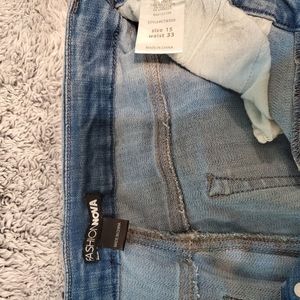 Angela Exposed Button Skinny Jeans-Md Blue Wash